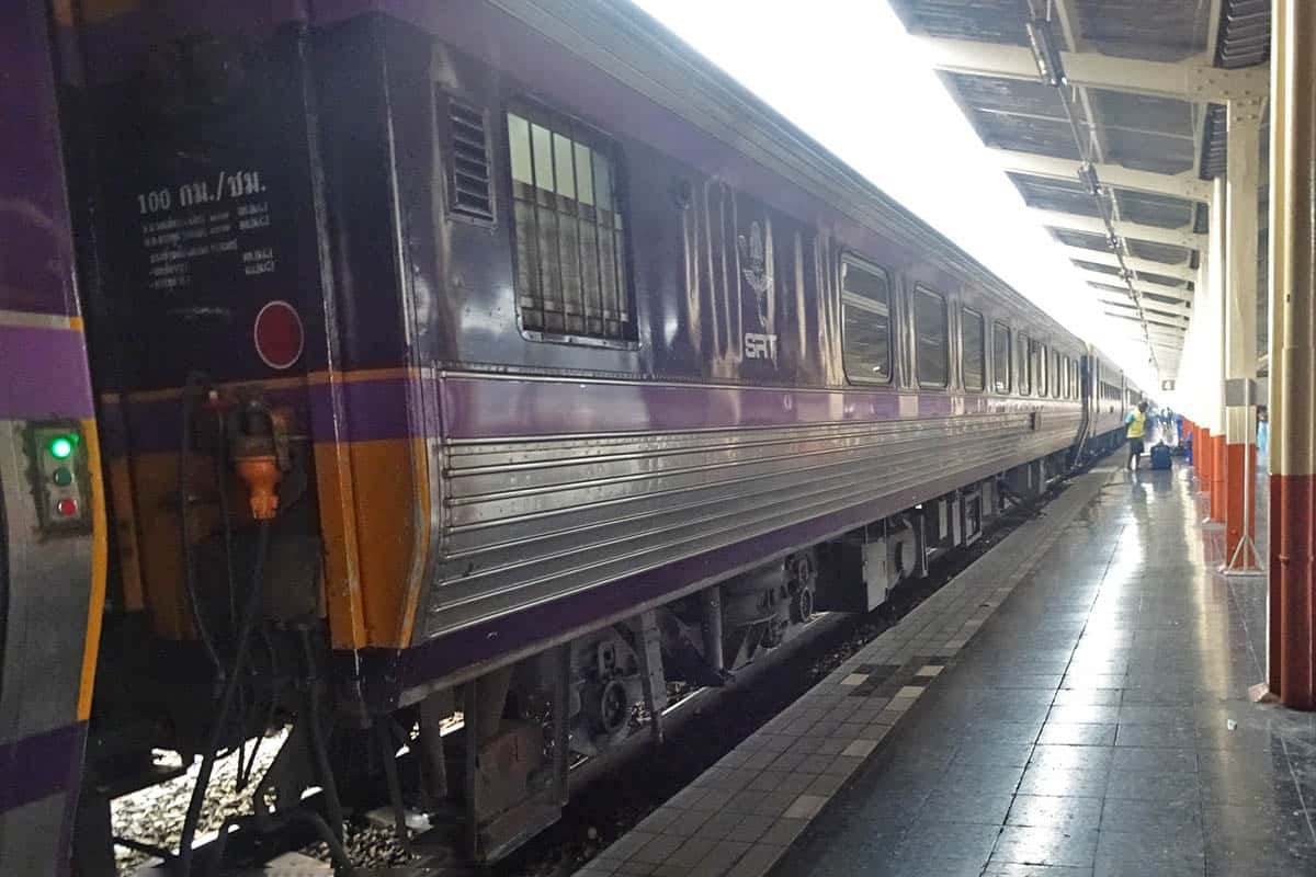 Purple colored train on platform