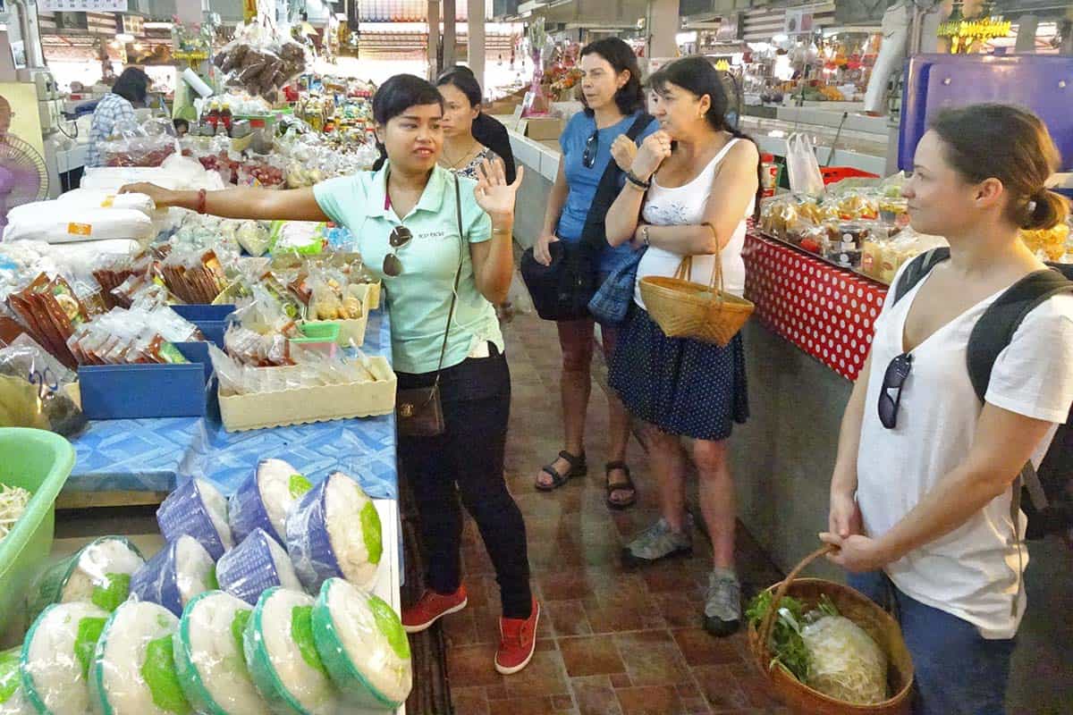 A group of people at a fresh produce market