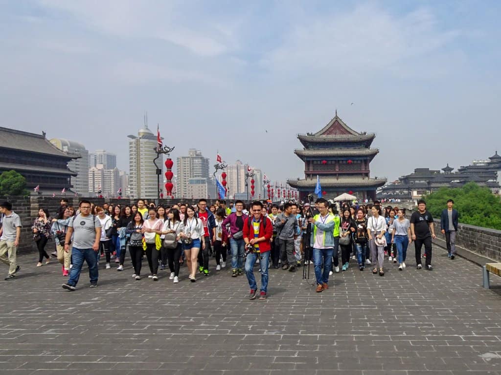 Large group of Chinese tourists on Xian City Wall