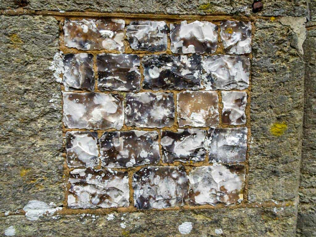 Flint wall on stone