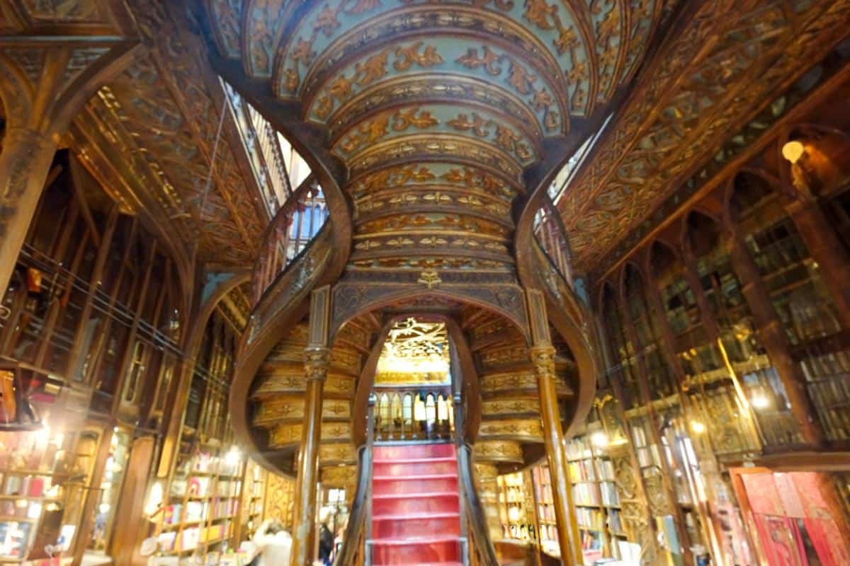 An ornate staircase inside a bookstore