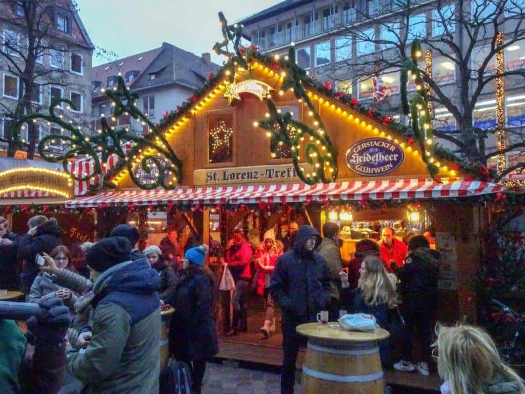People in warm coats at a christmas market