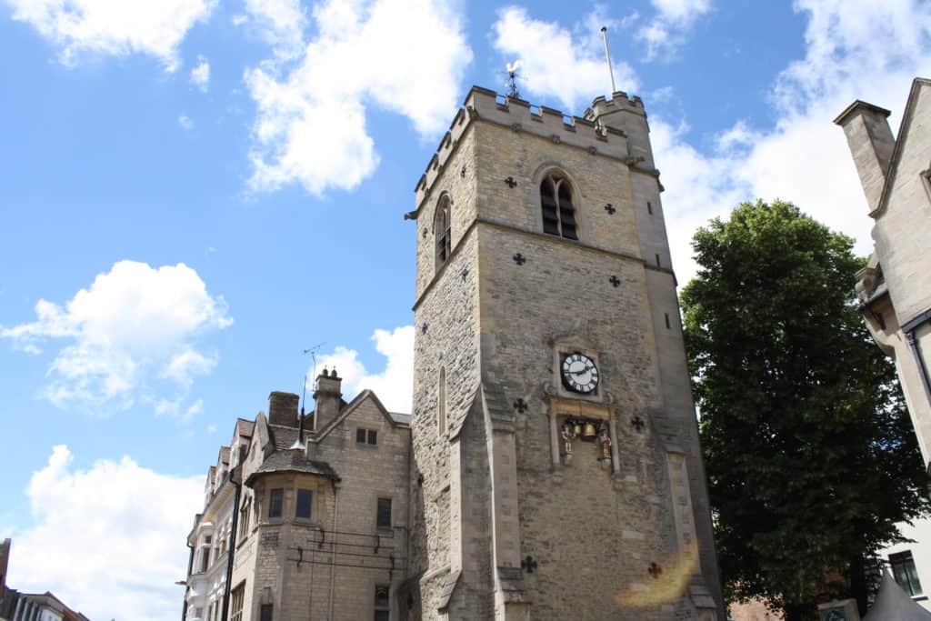 A church square tower with a clock
