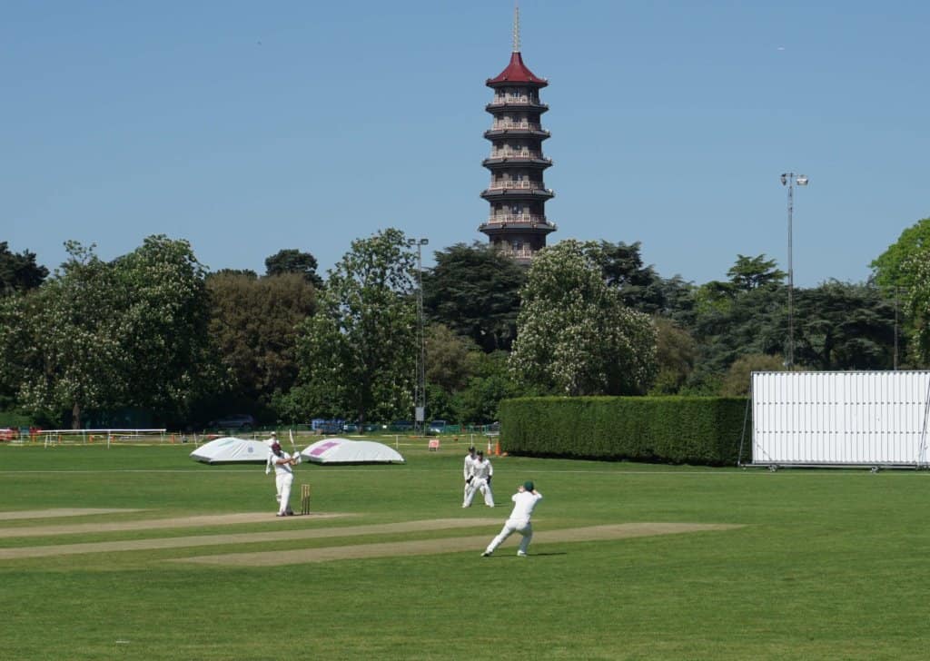 Richmond Cricket Club, London with view of Pagoda, Kew Garden
