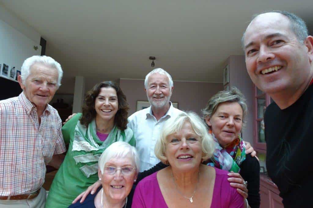 Seven people smiling