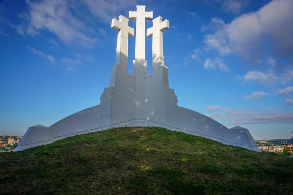 Three white crosses on a hill