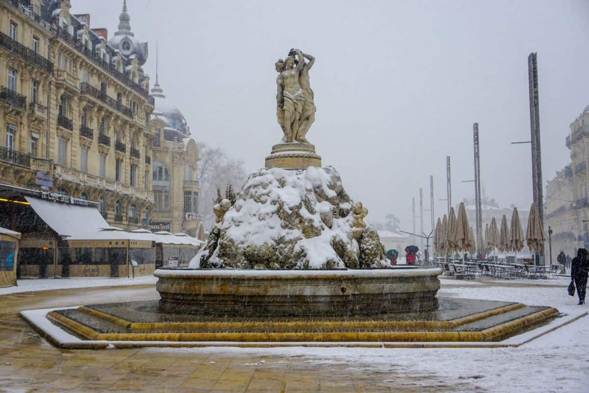 Snow on an ornate fountain