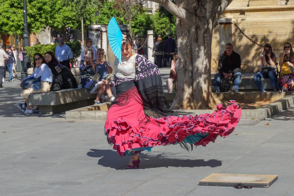 A lady dacing in a flamenco dress