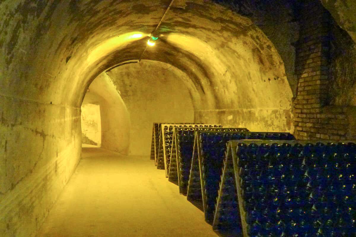 A cave of champagne bottles