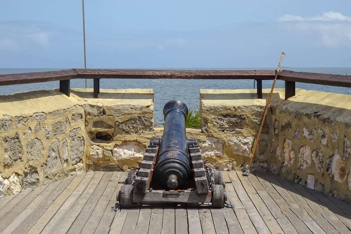 An old canon pointing out to sea