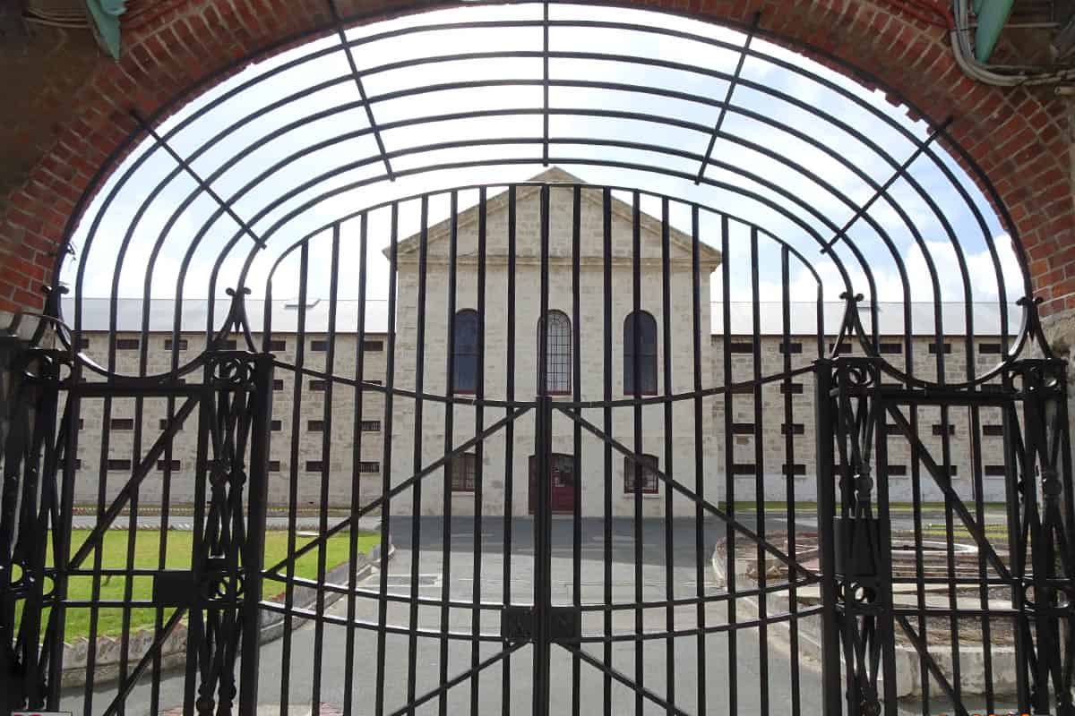 View of a prison through a gate
