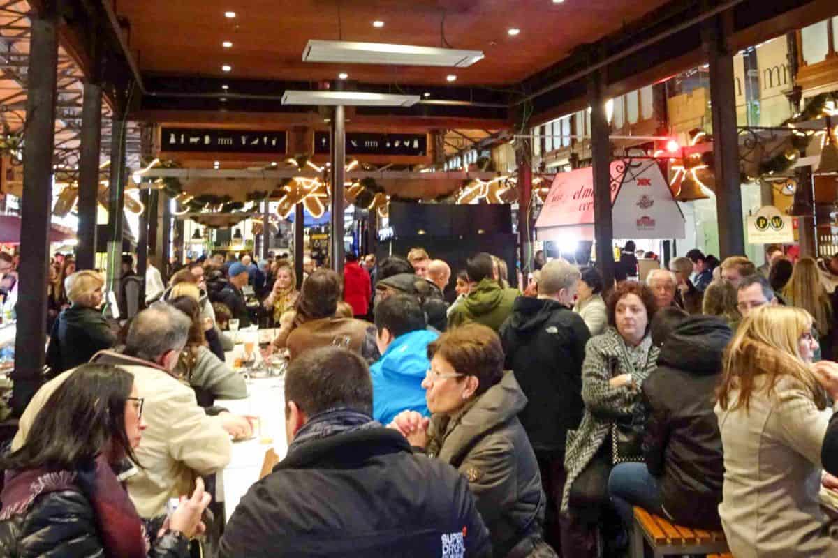 People eating inside a market