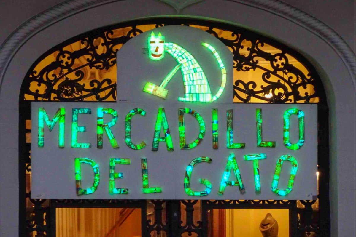 Green cat sign for artisan market