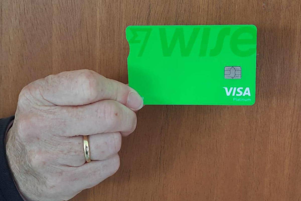 Green credit card being held