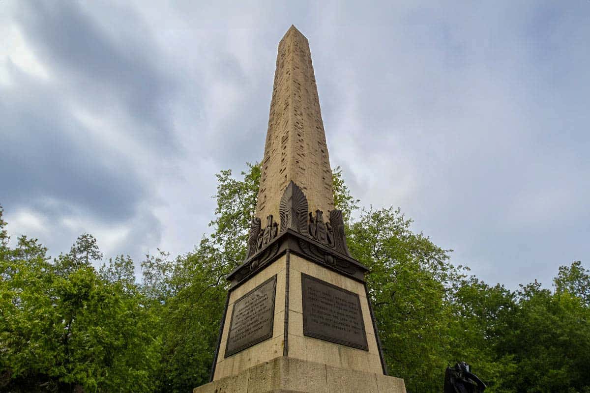 Tall stone obelisk with Egyptian hieroglyphics