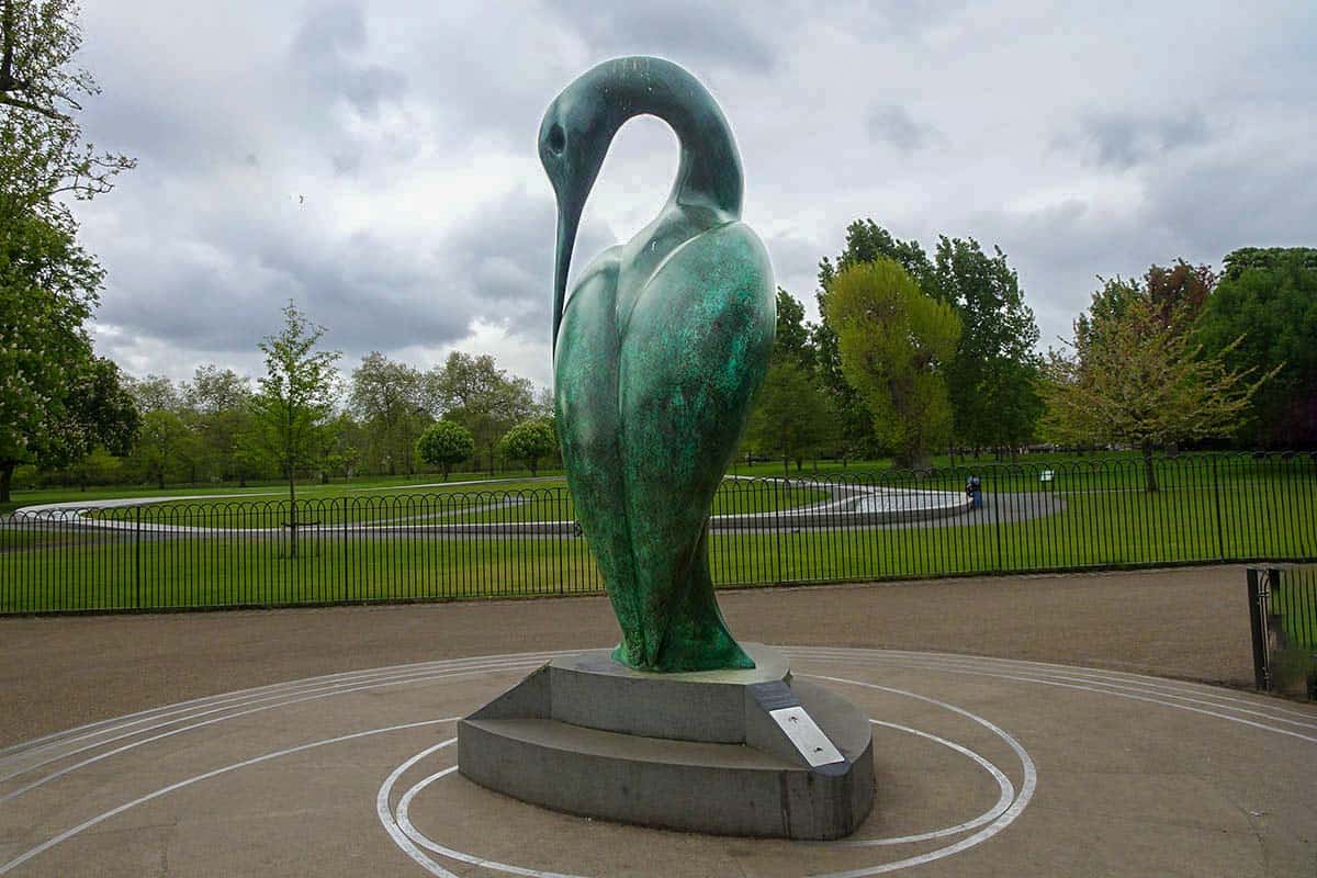 A bird statue carved from green stone