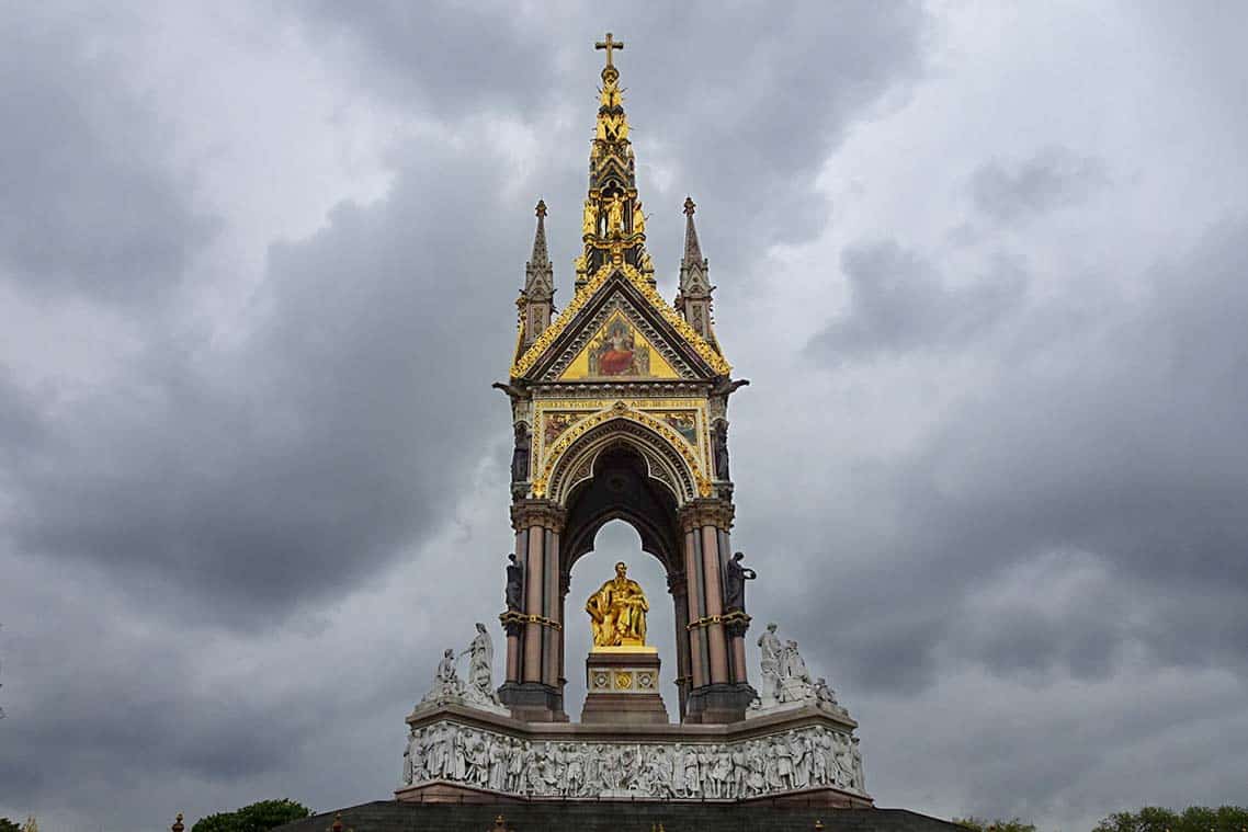 An ornate memorial with a gold statue