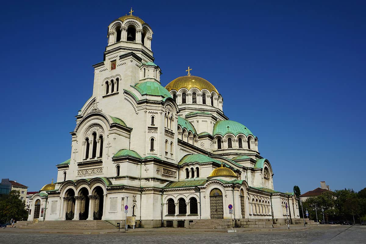 Large domed cathedral with gold and green cupulas